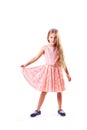 Pretty blondie six years old small girl on white background in pink prom dress Royalty Free Stock Photo