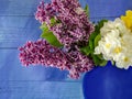 Blue vase with spring flowers Royalty Free Stock Photo