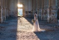 Pretty bride woman in elegant white lace dress with wedding bouquet Royalty Free Stock Photo