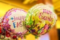 Pretty bright Easter Balloons against blurred background