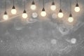 Pretty brilliant glitter lights defocused bokeh abstract background with light bulbs and falling snow flakes fly, festival mockup