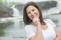 Pretty brunette adult woman portrait smiling outside Royalty Free Stock Photo