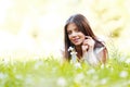 Pretty brunette girl laying on grass Royalty Free Stock Photo