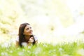 Pretty brunette girl laying on grass Royalty Free Stock Photo
