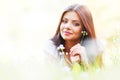 Pretty brunette girl laying on grass Royalty Free Stock Photo