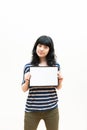 Pretty brunette girl showing blank picture frame Royalty Free Stock Photo