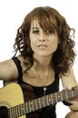 Pretty Brunette Guitar Player Royalty Free Stock Photo