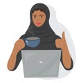 Arab girl with laptop. Pretty brunette is happy with work, shows thumbs up, pauses, drinks coffee. The concept of work