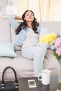 Pretty brunette relaxing on the couch