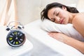 Pretty brunette sleeping on bed Royalty Free Stock Photo