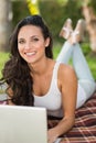 Pretty brunette using her laptop Royalty Free Stock Photo