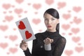 Pretty brunette with valentine postcard send a kiss