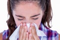 Pretty brunette woman blowing her nose Royalty Free Stock Photo