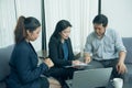 Pretty business interns listening to their team leader