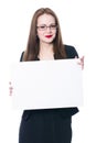 Pretty business woman in glasses holding a blank sign Royalty Free Stock Photo