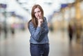 Pretty business woman making silence gesture over blur background Royalty Free Stock Photo