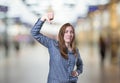 Pretty business woman making thumb down gesture over blur background Royalty Free Stock Photo