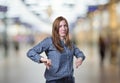 Pretty business woman making thumb down gesture over blur background Royalty Free Stock Photo