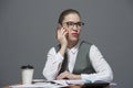 Pretty businesswoman pouting making a call Royalty Free Stock Photo