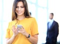 Pretty businesswoman using smart phone Royalty Free Stock Photo