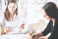 Pretty businesswomen doing paperwork Royalty Free Stock Photo