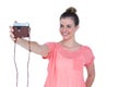 Pretty casual brunette taking a selfie with retro camera Royalty Free Stock Photo