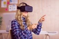 Pretty casual worker using oculus rift Royalty Free Stock Photo