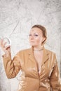 Pretty caucasian woman with her hands with crystal ball predicting the future on white background