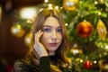 Pretty caucasian young girl, seductive lipstick and wavy hair in cafe Royalty Free Stock Photo