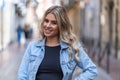 Caucasian young woman dressed in denim jacket Royalty Free Stock Photo