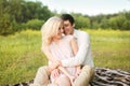 Pretty cheerful couple on picnic