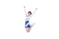 Pretty cheerleader girl jumping in the studio Royalty Free Stock Photo