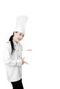 Pretty chef showing a blank billboard Royalty Free Stock Photo