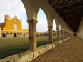 Pretty church, courtyard and arches of the Monastery of Izamal Royalty Free Stock Photo