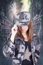 Pretty confident proud girl in military uniform Royalty Free Stock Photo