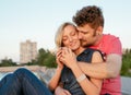 Pretty couple embrace outdoor.