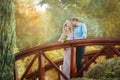 Pretty couple hugging and flirting in an urban park Royalty Free Stock Photo