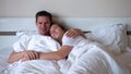 Pretty Couple Of Spouses Hugs In Bed