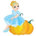 Little Cinderella sitting on a giant pumpkin