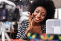 Pretty dark-skinned woman with bright makeup looking good