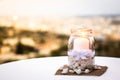 Pretty decorated candle table ornament with bright light.