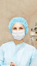 Pretty doctor woman portrait. Ophthalmology laser microscope operation. Clinic room. Patient eye treatment. Myopia and cataract Royalty Free Stock Photo