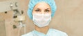 Pretty doctor woman portrait. Ophthalmology laser microscope operation. Clinic room. Patient eye treatment. Myopia and cataract Royalty Free Stock Photo