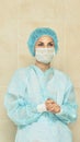 Pretty doctor woman portrait. Ophthalmology laser microscope operation. Clinic room. Patient eye treatment