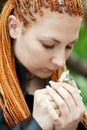 Pretty emotional girl with african braids