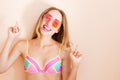 Pretty Emotional Young Woman In red Sunglasses Wearing Swimsuit Leaning Against Wall Royalty Free Stock Photo