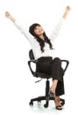 Pretty excited young woman sitting on chair Royalty Free Stock Photo