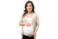 Pretty expectant mother caressing her round belly Royalty Free Stock Photo