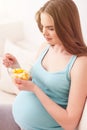 Pretty expectant mother prefers healthy food Royalty Free Stock Photo