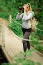 Pretty explorer woman with binoculars Royalty Free Stock Photo